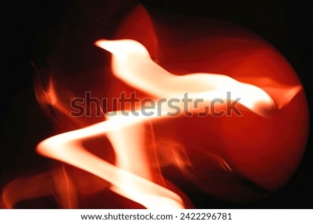 Flaming Soul, fire isolated and blurred light trails. The best quality ICM abstract art photography, for fine art prints and backgrounds.