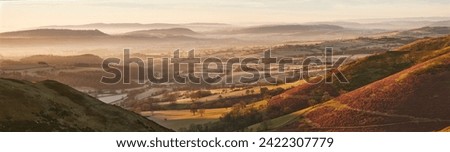 Beautiful Shropshire Hills Panorama During a Morning Sunrise Cloud Inversion over Church Stretton and Beyond Royalty-Free Stock Photo #2422307779