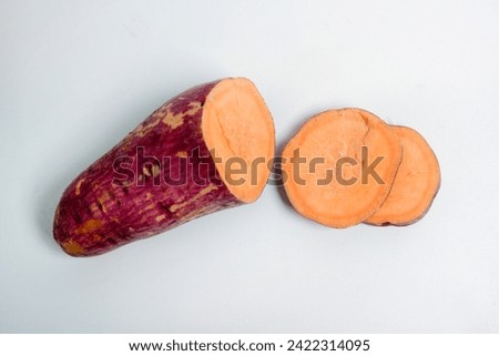 Sweet potatoes, Ipomoea batatas, is a type of cultivated plant. The part used is the roots which form tubers with high levels of nutrients (carbohydrates) Royalty-Free Stock Photo #2422314095