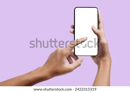 Various hands using cellphones, Asian hand models, with blank cellphones. Photos with a variety of views and formats, suitable for cellphone promotional media Royalty-Free Stock Photo #2422315319