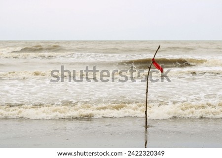 Beaches with big waves are marked with a red flag, meaning swimming is prohibited at that beach