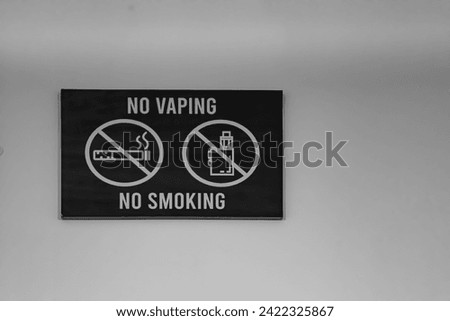 No Vaping Sign and No Smoking Sign