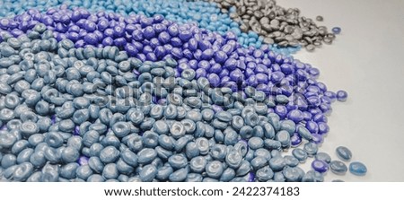 Colorful polymer masterbatch granules isolated on white background