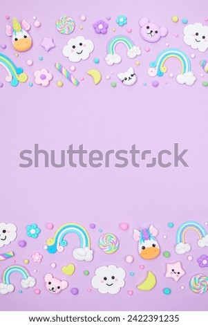 Trendy pastel purple kawaii banner background design template with cute air plasticine handmade cartoon animals, unicorns, stars, rainbows pattern. Top view, flat lay, copy space. Candycore, fairycore