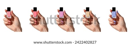 Set of female hands holding various nail polish bottles, presenting different nail colors, isolated on transparent background, beauty and fashion concept