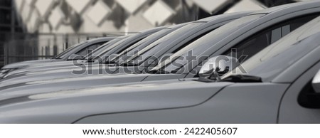 A lot of same white SUV cars in a rows. new modern or Used car sales. long perspective, Line of motor auto engine. Cars For Sale Stock Lot Row. Car Dealer Inventory. cars dealership place automaker 
 Royalty-Free Stock Photo #2422405607