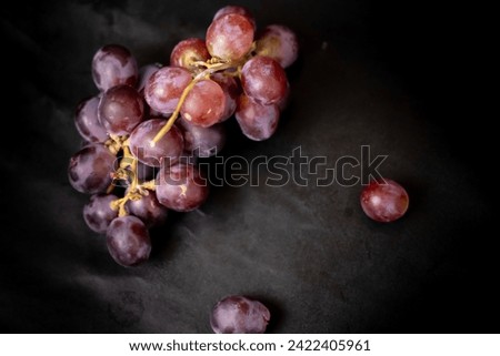 fresh grapes isolated in black background