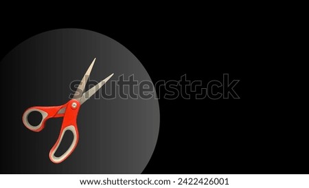 Red scissors art image, black background, free space for design.