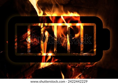 Battery fire, illustration of Li-Ion battery in front of burning fireplace Royalty-Free Stock Photo #2422442229