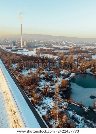 Aerial image of Savica lakes on the outskirts of Zagreb city, Croatia covered in snow and partly frozen due to low temperatures