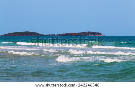 Beautiful large sea waves in the blue sea