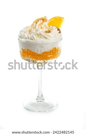 Sweet orange dessert with whipped cream