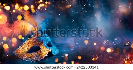 Carnival - Venetian Mask With Bokeh Lights - Masquerade Disguise With Confetti On Abstract Defocused Background Royalty-Free Stock Photo #2422503141