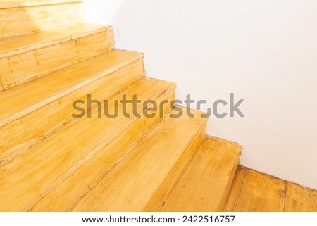 Brown wooden stairs in home,modern style conceptual interior empty room wide view,Minimal Modern architecture.