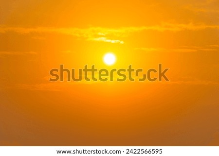 orange sky cloudless and bright yellow sun shining, nature landscape background.