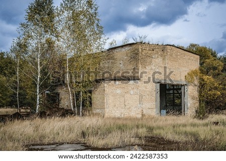 Building on wrecking yard near Illinci village in Chernobyl Exclusion Zone, Ukraine Royalty-Free Stock Photo #2422587353