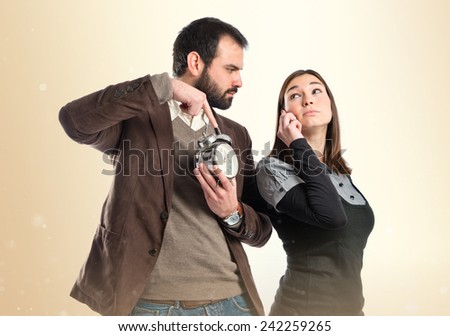 Angry man because his girlfriend talk so much on telephone 
