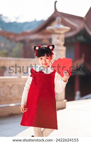 Girls celebrate Chinese Spring Festival happily