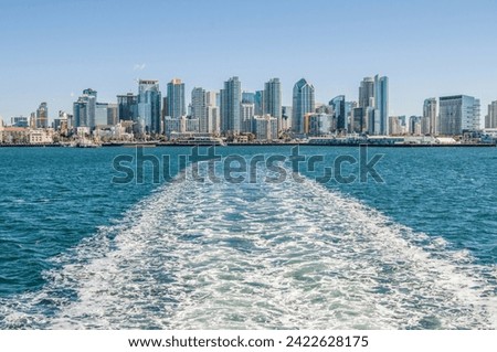 The bay of San Diego in the United States a city of California with a view of the city and buildings in a sunny winter morning of weekend, a tour in a ship by the bay