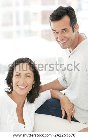 Portrait of a middle aged caucasian couple in love at home