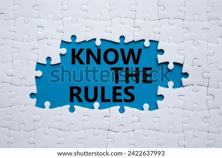 Know the rules symbol. Concept words Know the rules on white puzzle. Beautiful blue background. Business and Know the rules concept. Copy space.