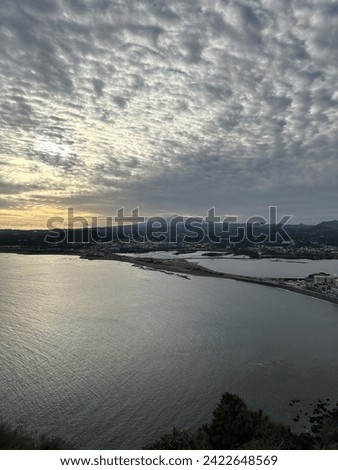 HDR Vertical Picture of Hallasan Mountain from far away, Sunset Jeju City