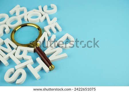 magnifying glass with space for text on blue background