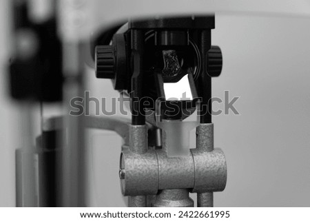 ophthalmic equipment placed in light contemporary optical shop for checking vision, slit lamp examination, ophthalmology concept, Slit lamp. Biomicroscope. Binoculars.	 Royalty-Free Stock Photo #2422661995