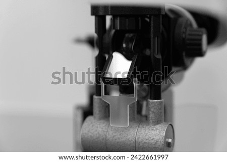 ophthalmic equipment placed in light contemporary optical shop for checking vision, slit lamp examination, ophthalmology concept, Slit lamp. Biomicroscope. Binoculars.	 Royalty-Free Stock Photo #2422661997