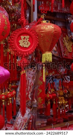 One of the most popular Chinese symbols of good luck on accessories during Lunar New Year is the Chinese character “fu”. 