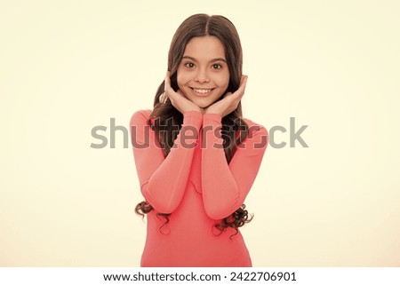 Beautiful teen girl student. Portrait of teenager school girl on isolated background. Clever schoolgirl, nerd smart child. Happy girl face, positive and smiling emotions.
