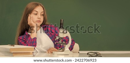 study biology, chemistry laboratory. research education. future scientist kid with scope. Banner of schoolgirl student. School child pupil portrait with copy space. Royalty-Free Stock Photo #2422706923