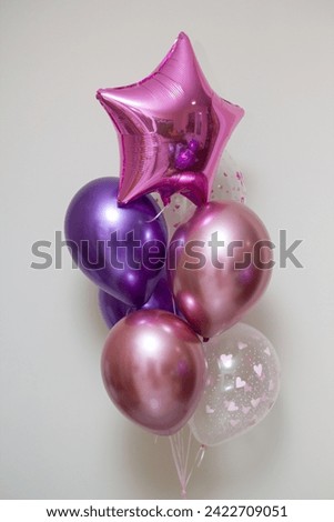 a bouquet of pink balloons on a white background, the inscription on the balloon "Happy birthday daughter"