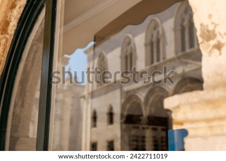 Clean store window in an old town street for logo promotion