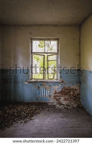 Old building in Illinci abandoned village in Chernobyl Exclusion Zone in Ukraine Royalty-Free Stock Photo #2422721397
