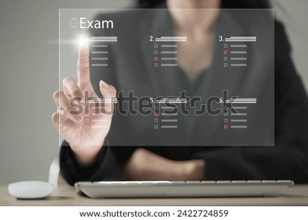 student passing online exam concept. Virtual test or questionnaire show on screen and answer check mark to measure grades. Education futuristic technology. Students taking online exams by laptop.