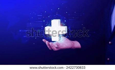 Businessman holding plus icon for health care medical, icon virtual medical health care with medical network connection, People health care awareness rising growth medical health life insurance bus