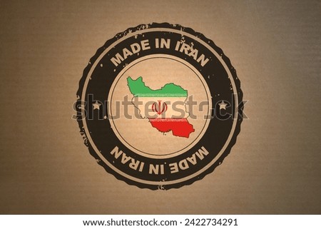 Brown paper with in its middle a retro style stamp Made in Iran include the map and flag of Iran.
