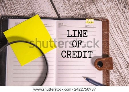 grandfather table with cup of coffee and text on page LINE OF CREDIT