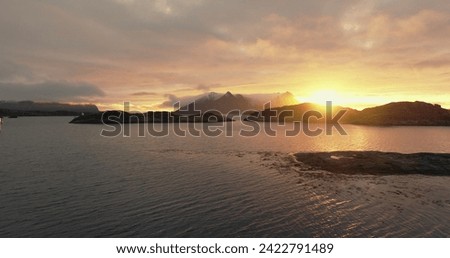 Arctic Sunset Glow: Lofoten Islands' Majestic Evening