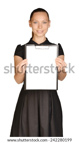 Beautiful girl holding a clipboard in hand and showing blank white paper