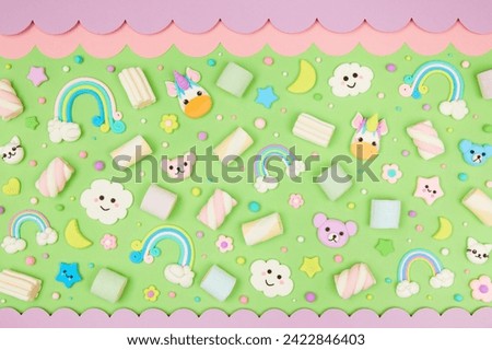 Trendy pastel green kawaii flyer, banner background design template with cute air plasticine handmade cartoon animals, unicorns, clouds, rainbows pattern. Top view, flat lay. Candycore, fairycore.