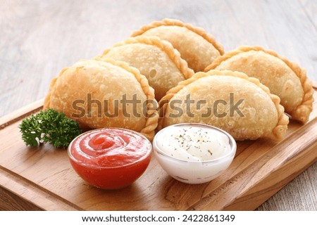 Food photography is a still life photography genre used to create attractive still life photographs of food. As a specialization of commercial photography,