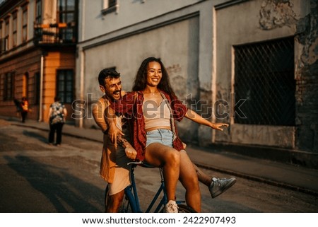 Smiling couple creating memories on a shared bike adventure