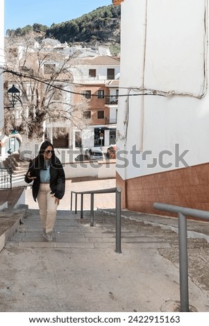 girl visiting and walking through charming villages in andalusia