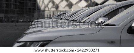 A lot of same white SUV cars in a rows. new modern or Used car sales. long perspective, Line of motor auto engine. Cars For Sale Stock Lot Row. Car Dealer Inventory. cars dealership place automaker 
 Royalty-Free Stock Photo #2422930271