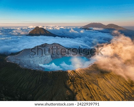 Aerial view of mount Kawah Ijen volcano crater at sunrise, East Java, Indonesia Royalty-Free Stock Photo #2422939791