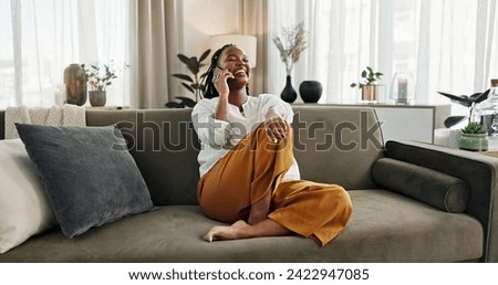Black woman on sofa, relax and phone call for good news, conversation and connection with smile in home. Happy girl on couch with smartphone, funny discussion and online chat in living room of house
