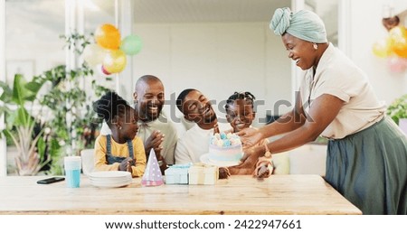 Birthday cake, family and children with parents for celebration, clapping and cheers for party at home. Happy, excited people, girl or kids with dessert and singing, kiss and love or support on patio