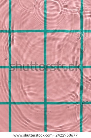 Water texture on pink checkered pattern background on the noon sunlight. Copy space